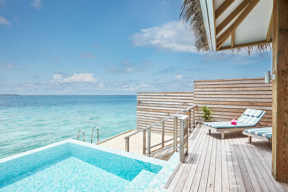 Sun Siyam Iru Veli overwater villa with private pool and turquoise lagoon, 2026 all-inclusive package