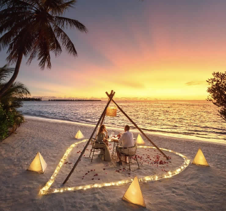 a beach BBQ dinner with seafood in maldives