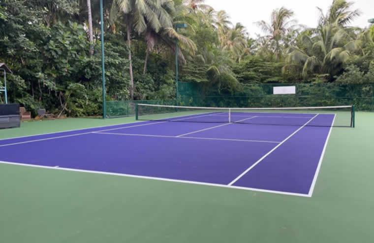 tennis court at amilla maldives resort