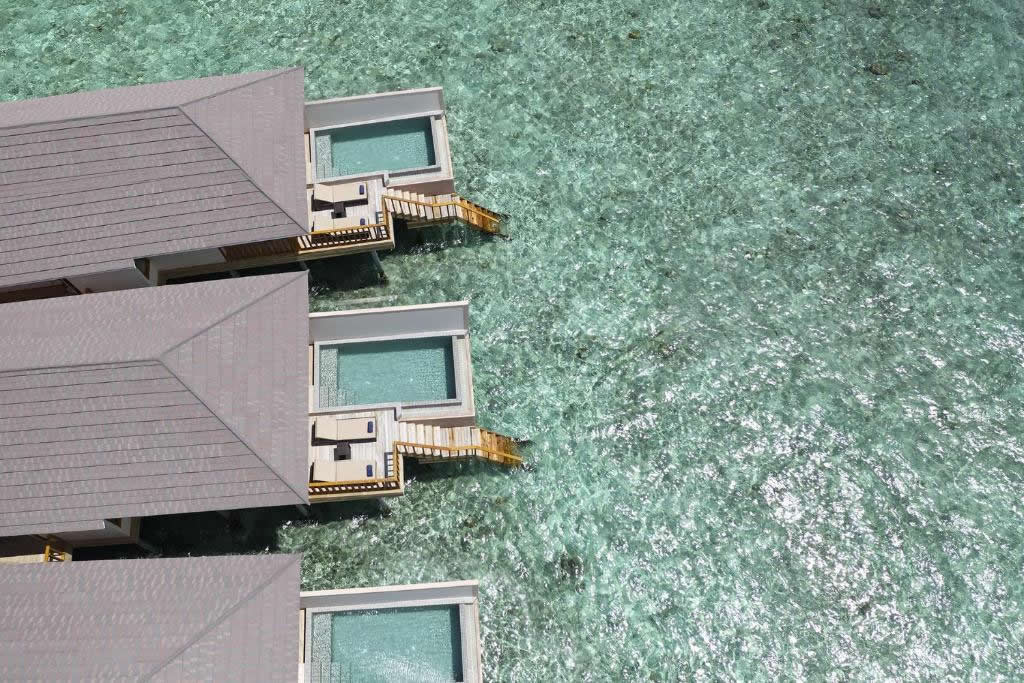 water pool villas over blue lagoon