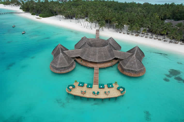 a new look overwater bar in maldives