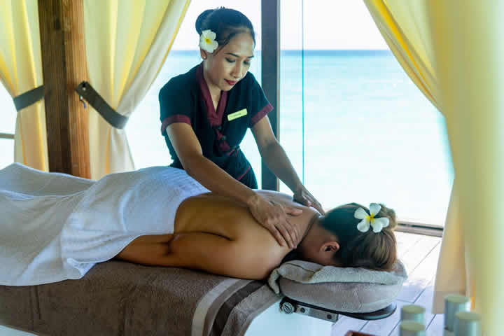 massage at overwater spa in maldives