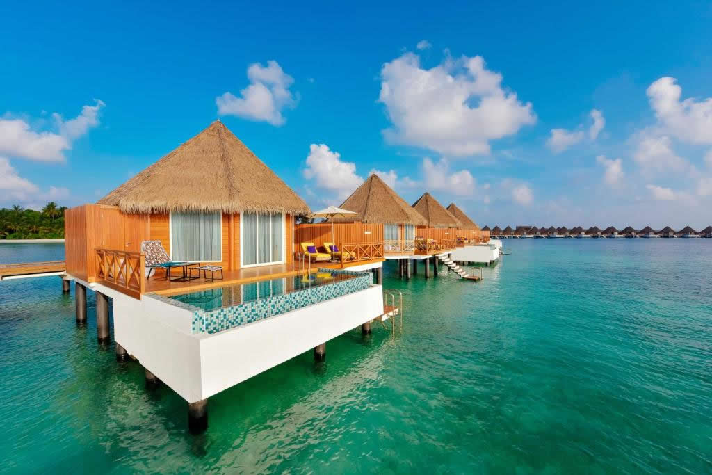 Mercure Maldives Kooddoo Resort, overwater bungalows sunset view