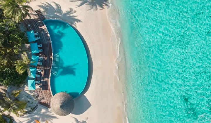 beach pool in maldives resort